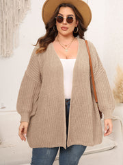 Chunky knit cardigan in tan with balloon sleeves and an open front.