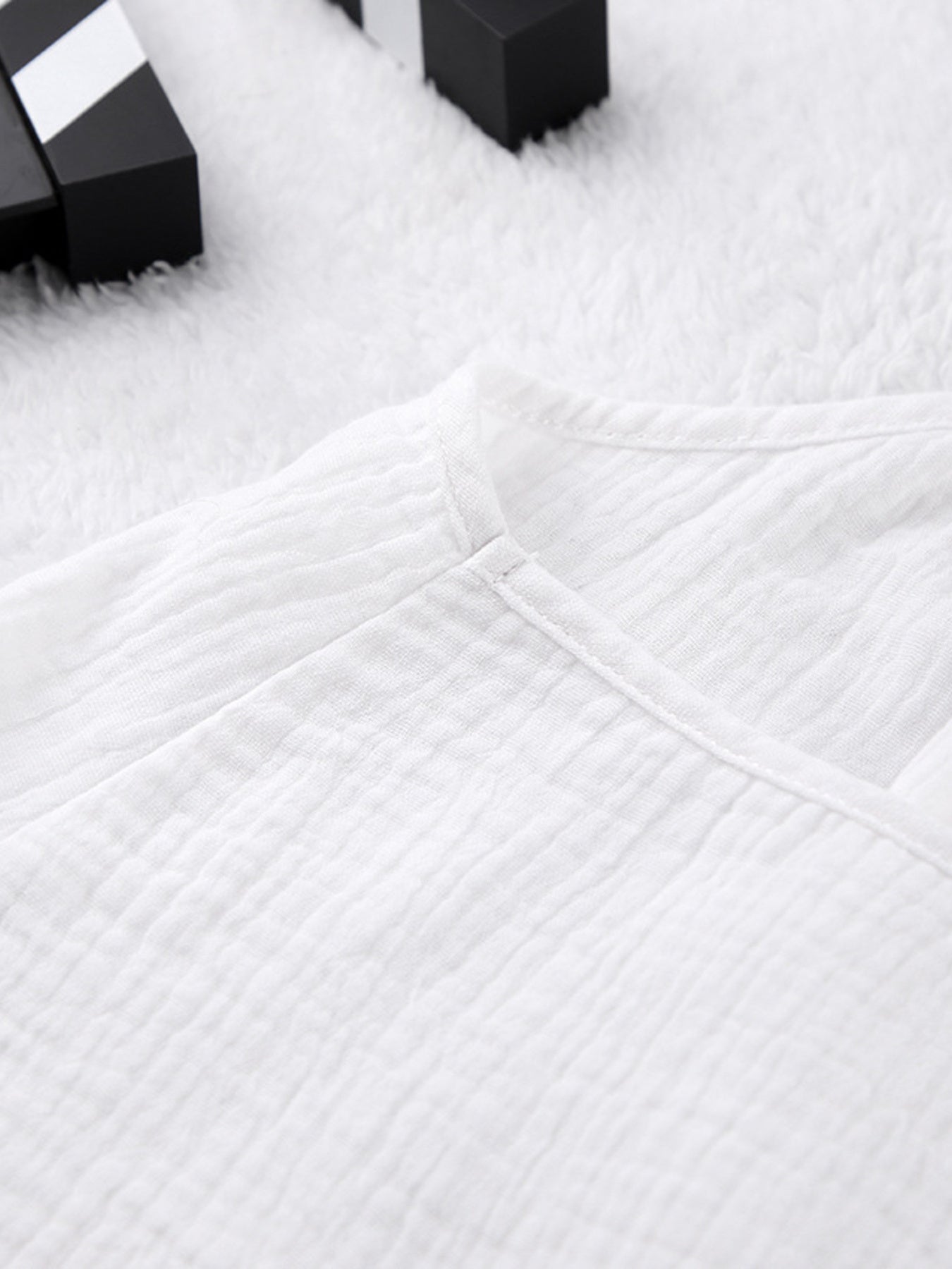 White cotton cami pajama top with textured fabric and V-neck detail