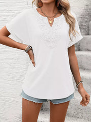 White relaxed fit t-shirt with lace trim neckline and cuffed short sleeves.