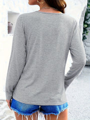 Light gray long sleeve tee with a lattice neckline detail.
