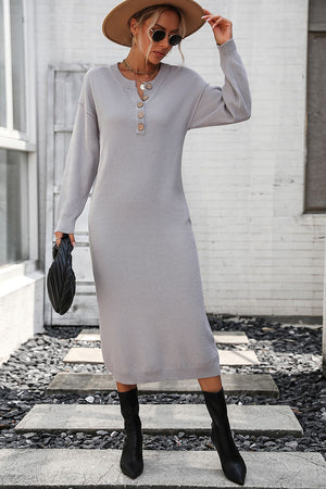 Light gray textured knit henley midi dress with button detail and long sleeves.