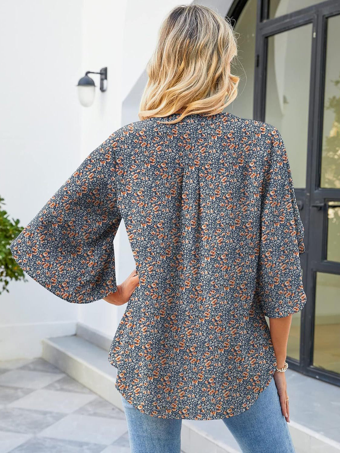 Floral print blouse with flutter sleeves and V-neck in polyester