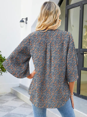 Floral print blouse with flutter sleeves and V-neck in polyester
