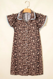 Leopard print cotton mini dress with button front, ruffled short sleeves, and lace trim.