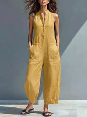 Yellow button-down sleeveless romper with pockets and wide legs