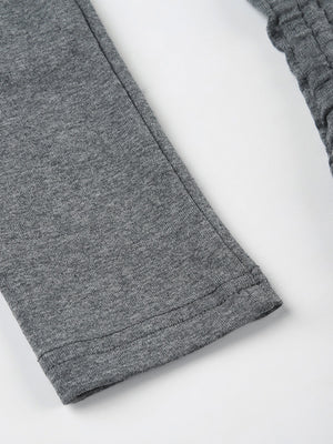 Grey ruched bodycon mini dress sleeve detail with ribbed texture and drawstring.