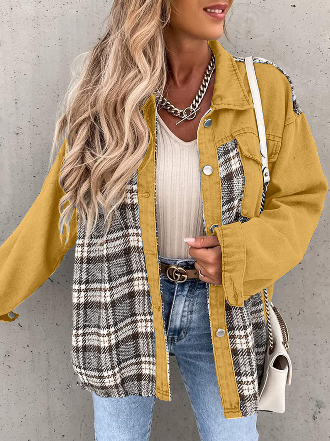 Panelled plaid denim hybrid jacket in camel with button front and long sleeves.