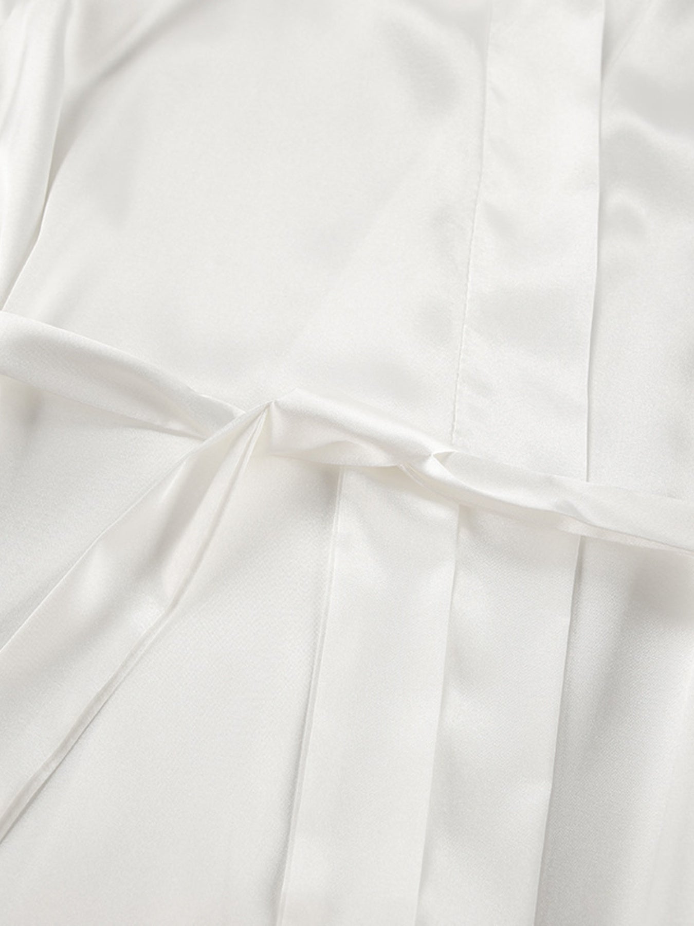 White satin lounge set with lace trim and drawstring detail