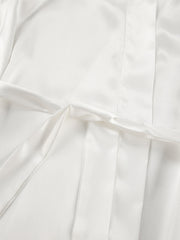 White satin lounge set with lace trim and drawstring detail