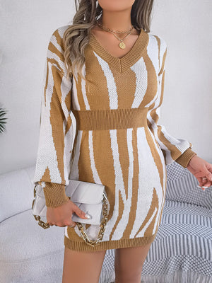 Tan zebra stripe knit fit-and-flare dress with v-neck and long sleeves.