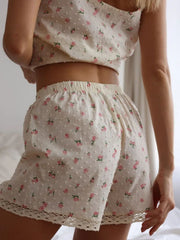 Floral lace trim cami and shorts set with pink roses and textured dots.