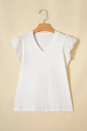 White cotton maternity t-shirt with V-neck and delicate eyelet flutter sleeves.