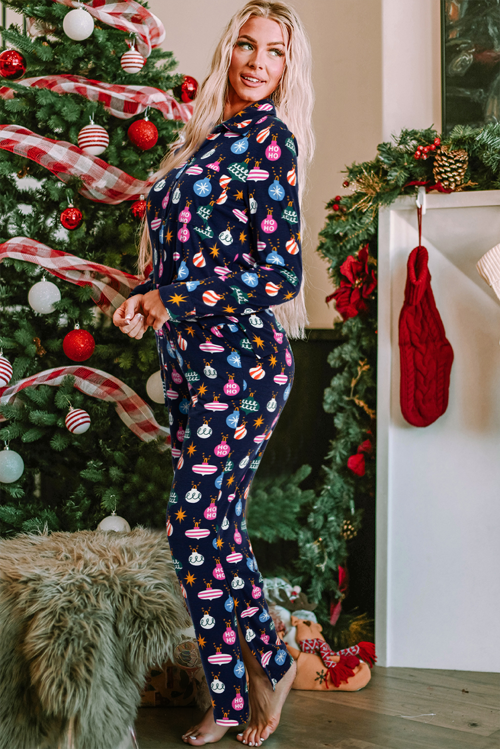 Navy blue loungewear set with festive bauble print, collared long sleeve top and pants.