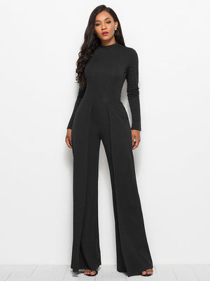 Black high-waisted palazzo jumpsuit with long sleeves and front slit pants.