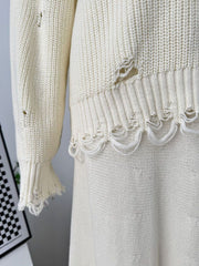 Off white distressed cotton sweater set with deconstructed hem and sleeve details.