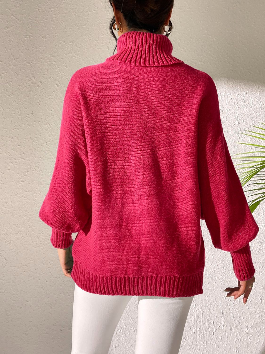 Deep Red turtleneck sweater with balloon sleeves and ribbed cuffs and hem.