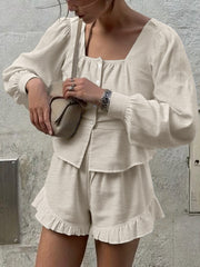 Beige button front lantern sleeve top and ruffled hem shorts set