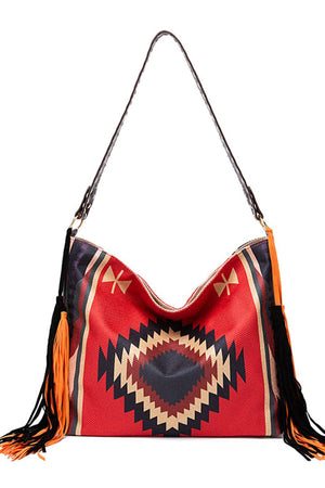 Southwestern hobo bag in red with geometric pattern and fringe details