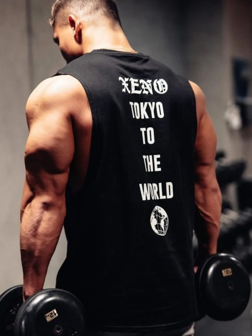 Black Xeno Tokyo graphic muscle tank top with globe logo.