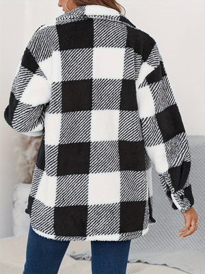 Oversized black and white checkerboard sherpa shacket with button-down front and fuzzy texture.