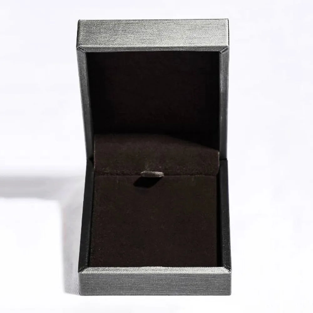 Silver pendant necklace jewelry box with dark interior.