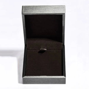 Silver pendant necklace jewelry box with dark interior.