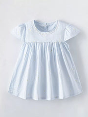 Baby dress in light blue gingham with yellow dots, cap sleeves, and lace collar.