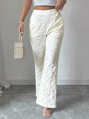 White floral textured high-waisted maternity pants with a wide leg