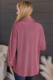 Textured stripe oversized shirt in dusty pink with button cuff detail.