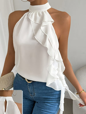 White ruffled halter neck blouse with a mock neck and keyhole detail.