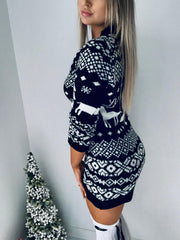 Black Fair Isle knit mini dress with reindeer and snowflake pattern.