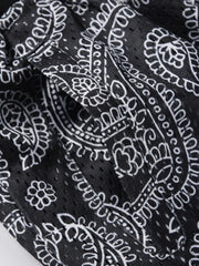 Black paisley mesh basketball shorts with a pocket detail.