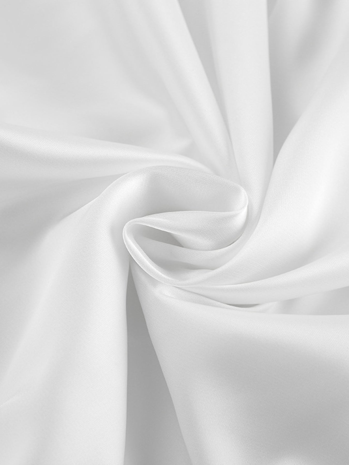 White flowy maxi skirt fabric detail with soft folds