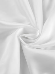 White flowy maxi skirt fabric detail with soft folds