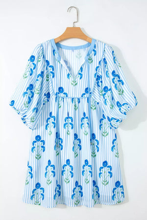 Floral stripe puff sleeve mini dress with blue floral print and tie neck.