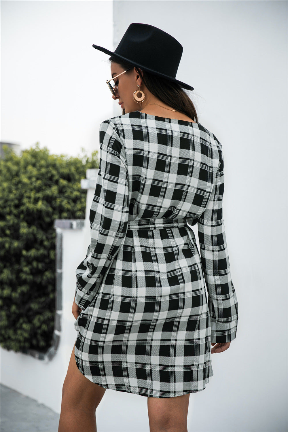 Belted black plaid shirtdress with V-neck and 3/4 sleeves