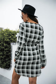 Belted black plaid shirtdress with V-neck and 3/4 sleeves