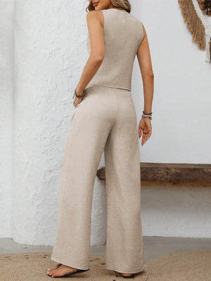 Tailored linen vest and palazzo pants set in Dust Storm beige, showing back view.