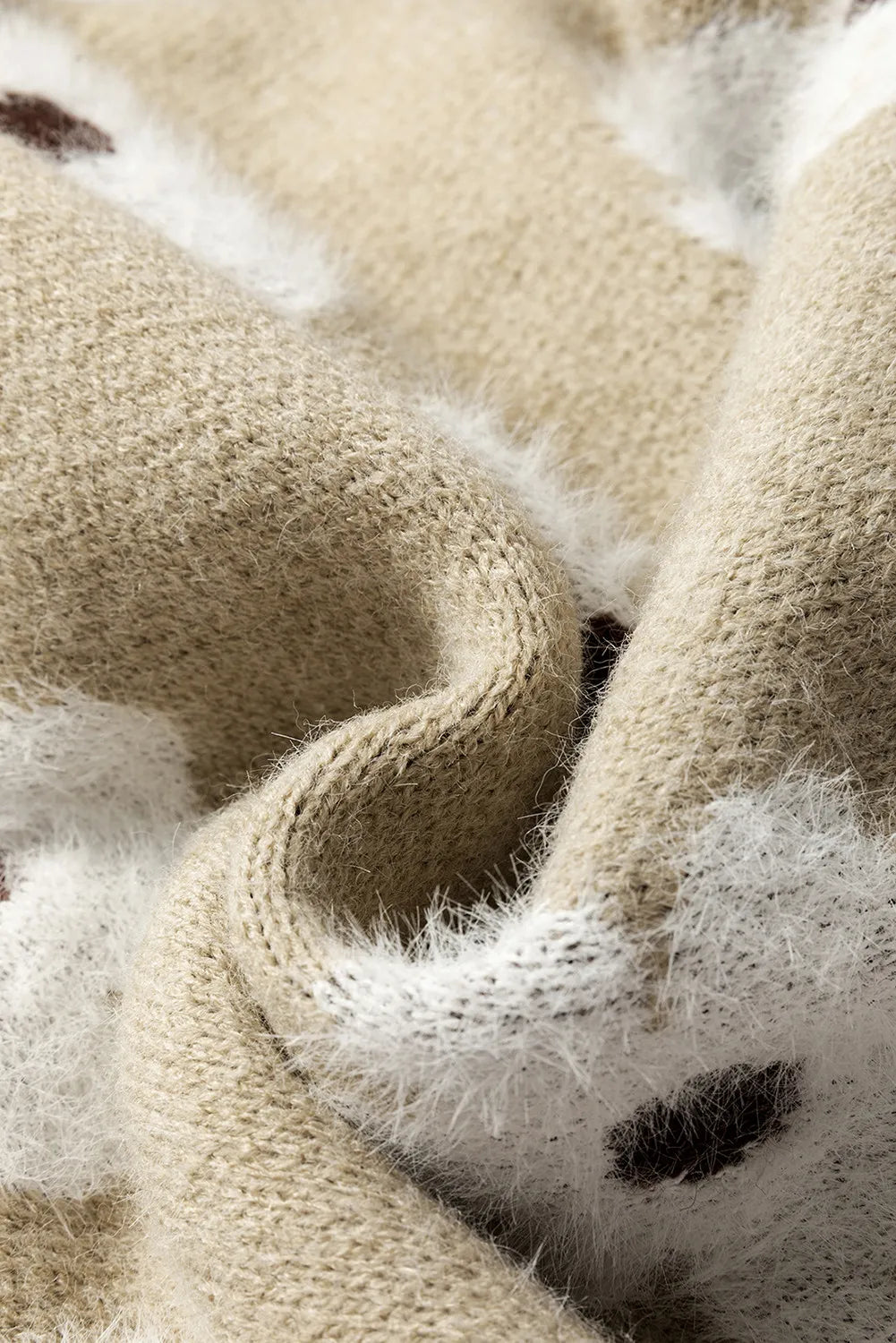 Tan acrylic sweater with fuzzy white and dark floral intarsia pattern detail