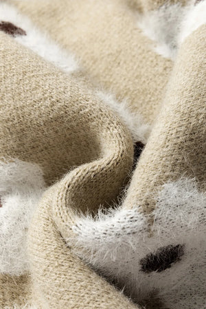 Tan acrylic sweater with fuzzy white and dark floral intarsia pattern detail