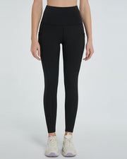 Black pocketed sculpt leggings with a high waist and full length.