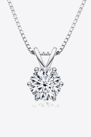Silver moissanite pendant necklace with 1 carat round brilliant cut stone on 925 sterling silver box chain.