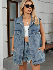 Denim vest with American flag pattern, button front, chest pockets, and collar.