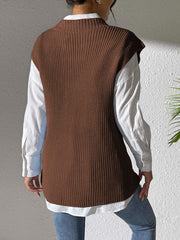 Coffee brown ribbed knit sleeveless vest with mock neck over white shirt