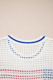 White eyelet knit sweater with blue neckline trim and red/blue stripes.