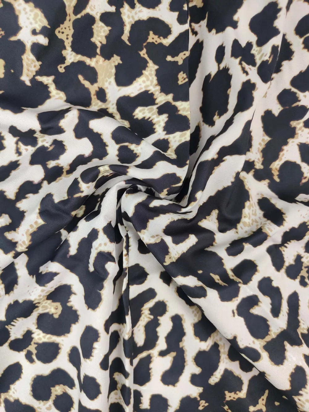 Maxi swim dress in leopard print with a sweetheart neckline.