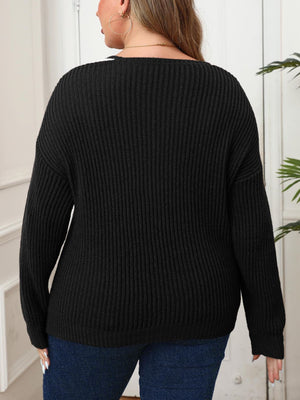 Black ribbed knit sweater with V-neck and contrast trim detail