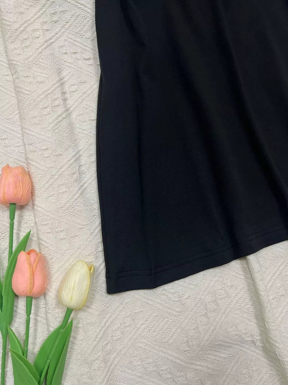 Black scoop neck cami detail with stitched hem