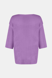 Lavender knit sweater with flared sleeves and V-neck.