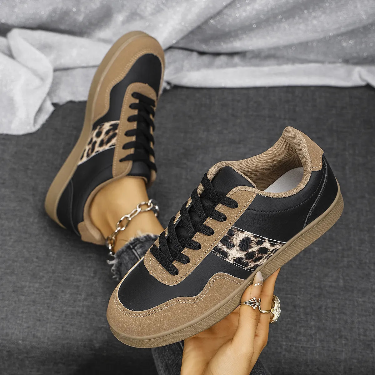 Leopard panel retro sneakers in taupe and black with lace-up closure.